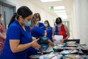 Health care workers receive food 
