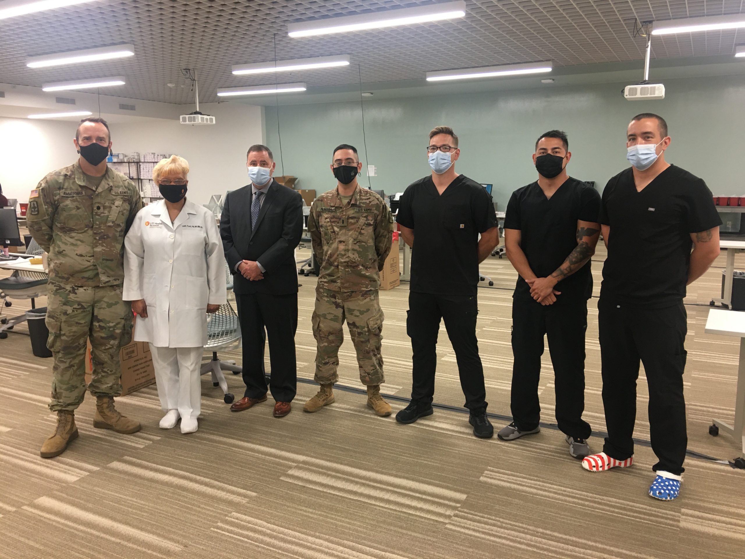 group photo of members of the Texas National Guard and UT Health San Antonio.